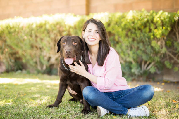 istock Woman with pet dog 951955814