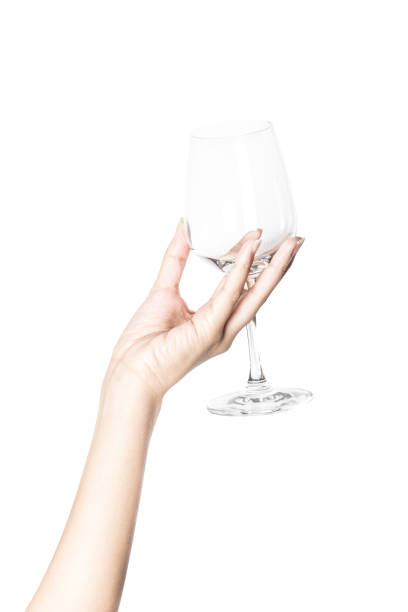 hand holding a glass of wine isolated on white - toast glass cut out human hand imagens e fotografias de stock