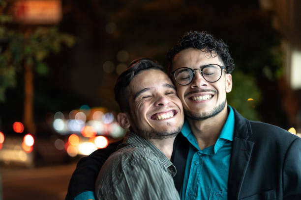 istock Gay Coworkers Embracing 951968430