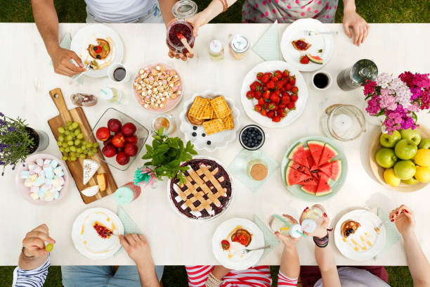 Group of young people eating
