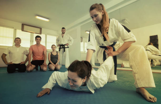 istock Female coach showing painful hold 951969854
