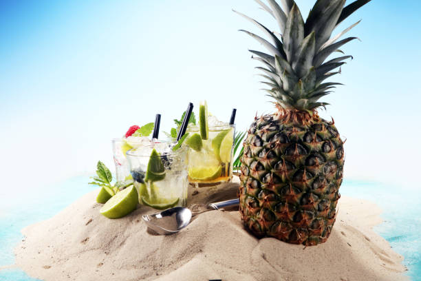 istock Different types of mojito cocktail on the beach. 951972880