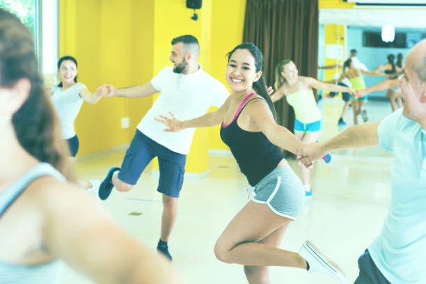 istock Happy men and women enjoying active dance 951973244