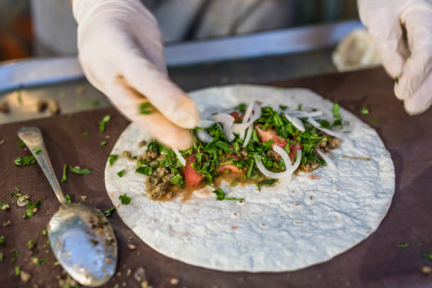 istock Healthy tortilla wrap preparation 951973808