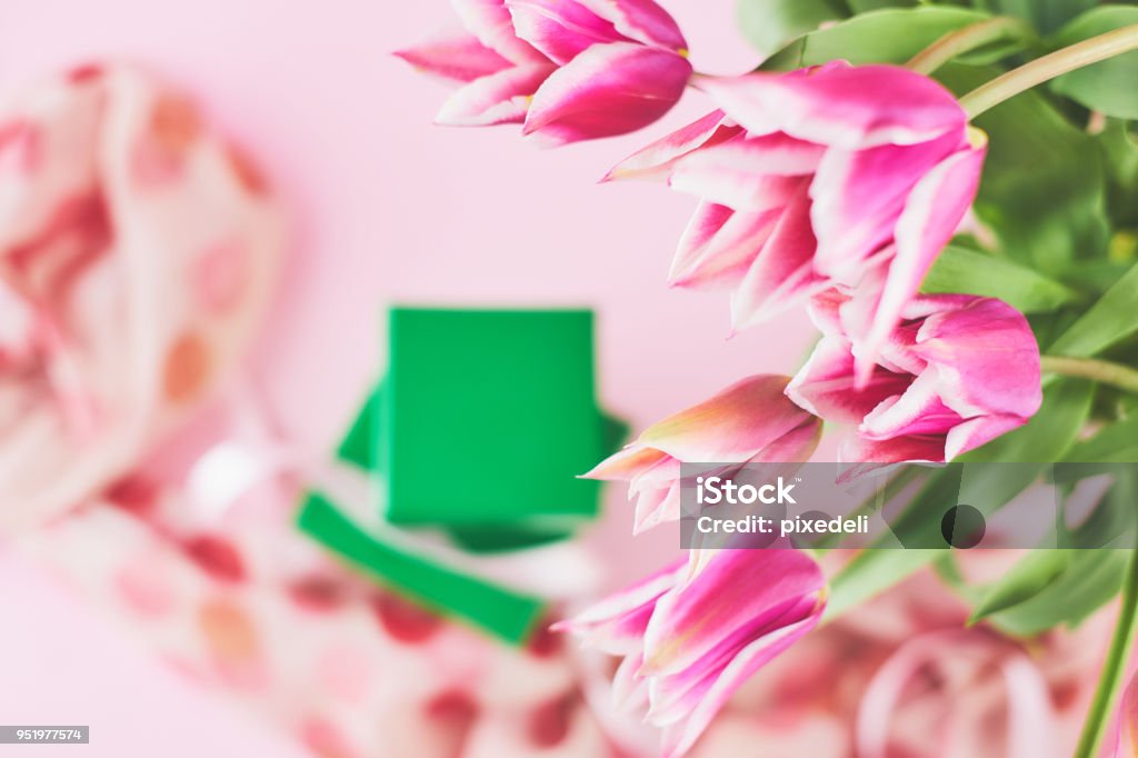 Pink tulips bouquet for Mother's day with brush-lettering card Arrangement Stock Photo