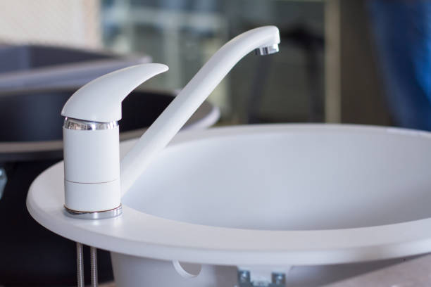 istock Modern kitchen and bathroom water faucets in the store 951977898