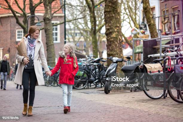 Happy Mother And Daughter Stroll Around The Old City Delft Netherlands Stock Photo - Download Image Now