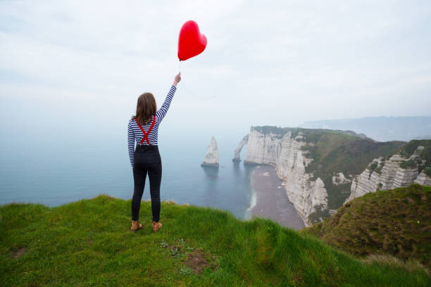 istock girl with balloon 951978880