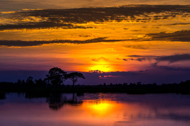 istock twilight Beauty Evening colorful clouds - sunlight with dramatic sky.Dramatic sky reflection in water. 951982662