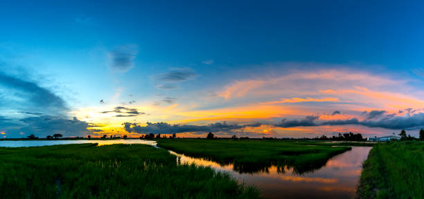 istock twilight Beauty Evening colorful clouds - sunlight with dramatic sky.Dramatic sky reflection in water. 951982724