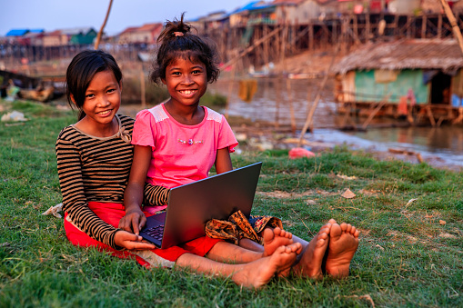 Happy Cambodian Girls Using Laptop In Village Cambodia Stock Photo -  Download Image Now - iStock