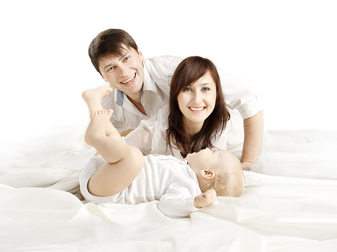 Family Portrait, Mother Father and Baby, Happy Parents with one year old Kid Son, People over White background