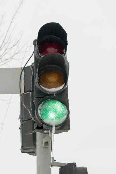 istock Traffic light in the snow with icicle, winter, freezing 951992994