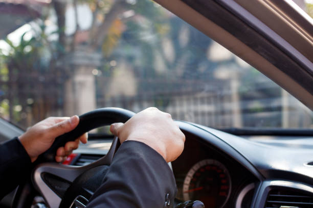 istock Businessman driving his car 951995864
