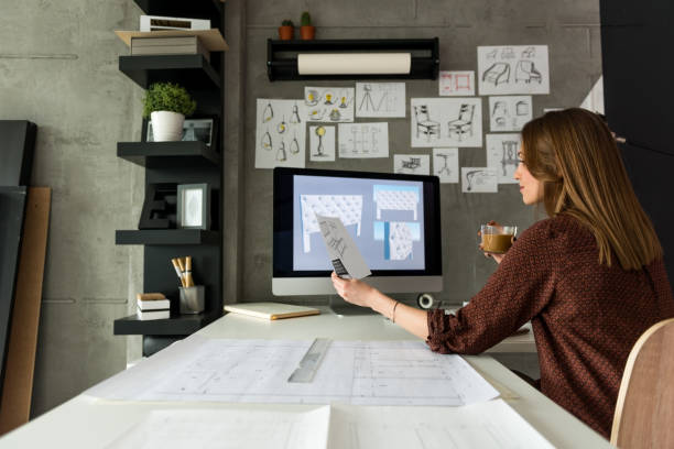 istock Looking at my sketches and drinking coffee 951997736