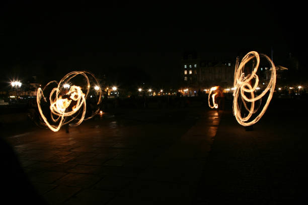 istock Fire show. Dancing with fire at night , Paris. France 952002214