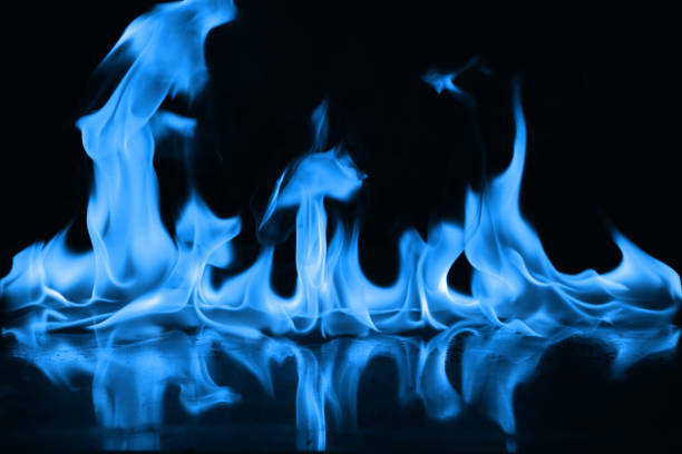 istock Beautiful blue fire flames on a black background 952005606