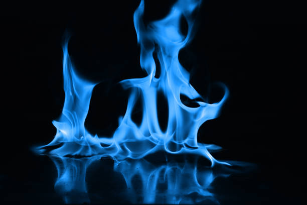 istock Beautiful blue fire flames on a black background 952005668