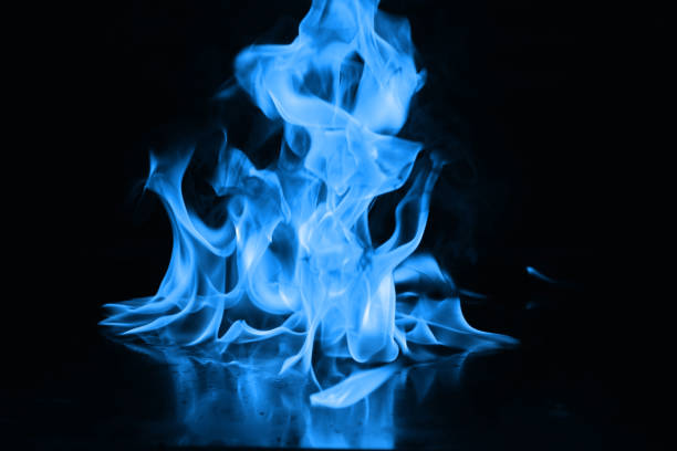 istock Beautiful blue fire flames on a black background 952005722
