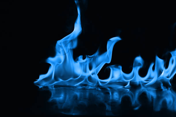 istock Beautiful blue fire flames on a black background 952005726