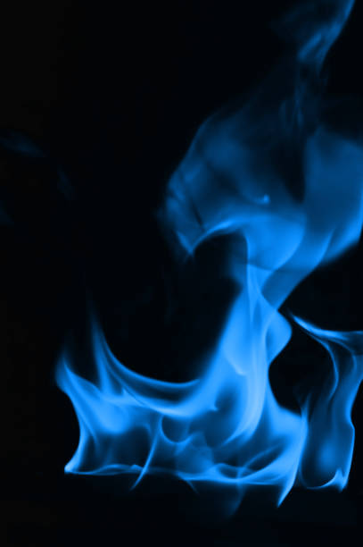 istock Beautiful blue fire flames on a black background 952005808