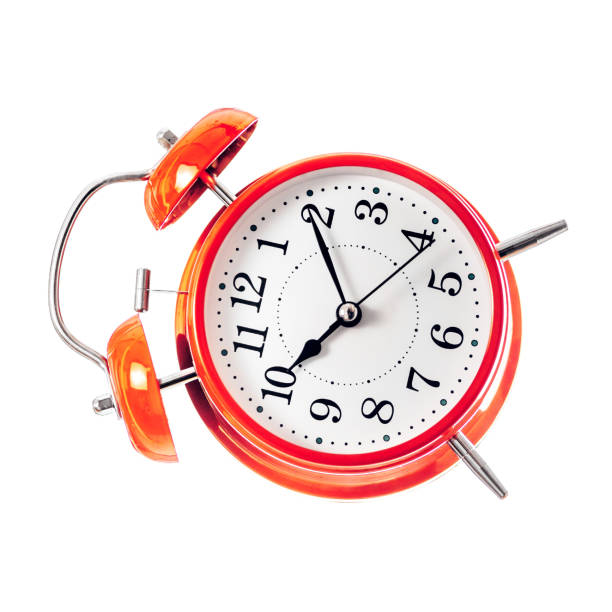 istock Flying vintage red alarm clock in old style isolate on white background 952005906