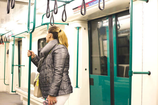 istock Beautiful young woman in metro 952008032