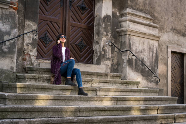 istock Beautiful young female talking on mobile phone 952009636