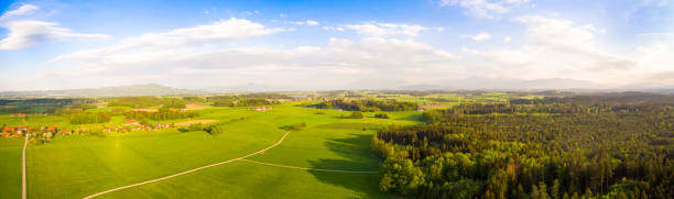 istock Aerial view: Bavarian landscape in spring at sunset 952011290