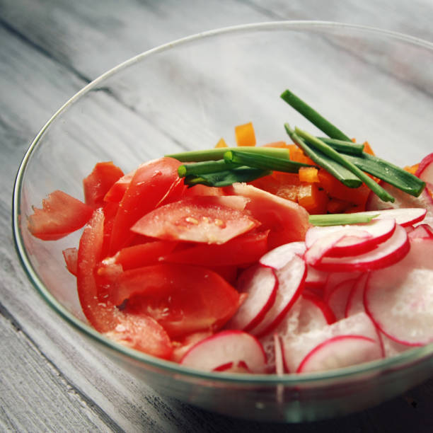 istock Glass bowl with vegetables for a vegetarian salad 952012214