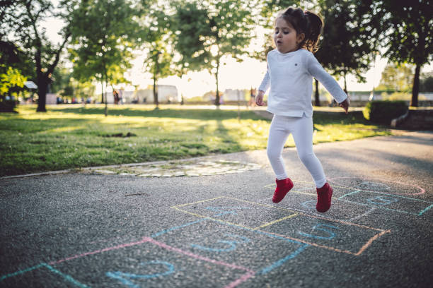 istock Playing hopscotch in the park 952016208