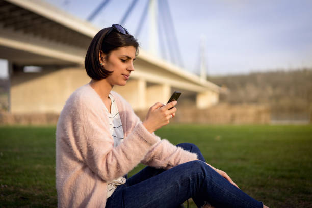 istock Beautiful young female outdoors in park 952016842