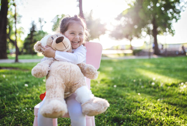 istock Lovely child doctor hugging her bear patient 952017490