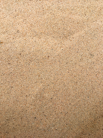 Beach sand background pattern.