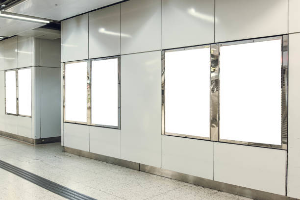 istock Six portrait orientation blank mock up advertisement light boxes at a metro station 952025708