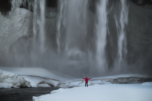 Selfie at Skogafoss waterfall in winter, Iceland