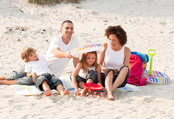 istock Family playing with the sand 95203019