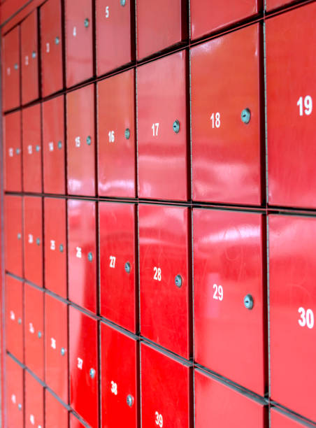 istock Group of red letterbox in a post office with number range 952034794