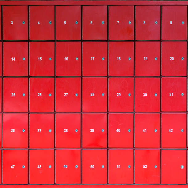 istock Group of red letterbox in a post office with number range 952034822