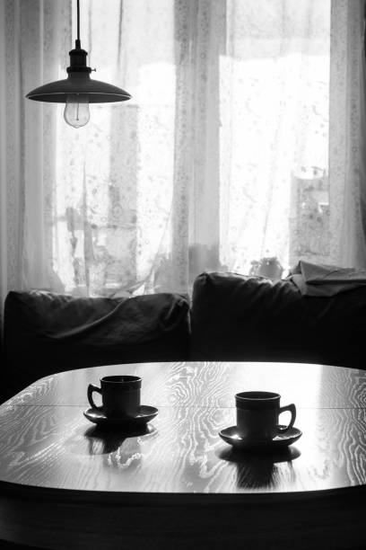 istock Breakfast at home under the cozy lamp. Black and white 952035026