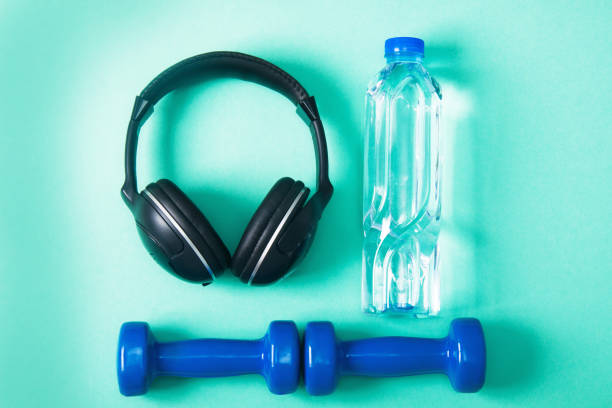 istock Sport flat lay composition with dumbbells and headphones 952036882