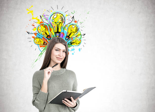istock Smiling woman with a planner, good idea 952037882