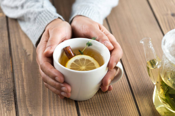 istock Woman with herbal tea 952038426