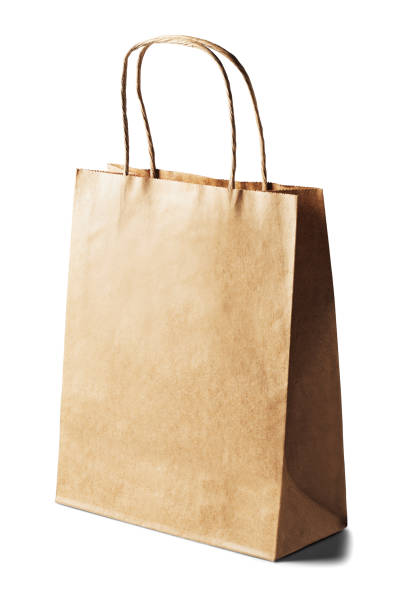 istock kraft paper ecologic bag on isolated white background with shadows 952039500
