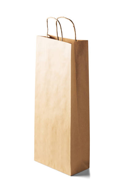 istock kraft paper ecologic bag on isolated white background with shadows 952039526