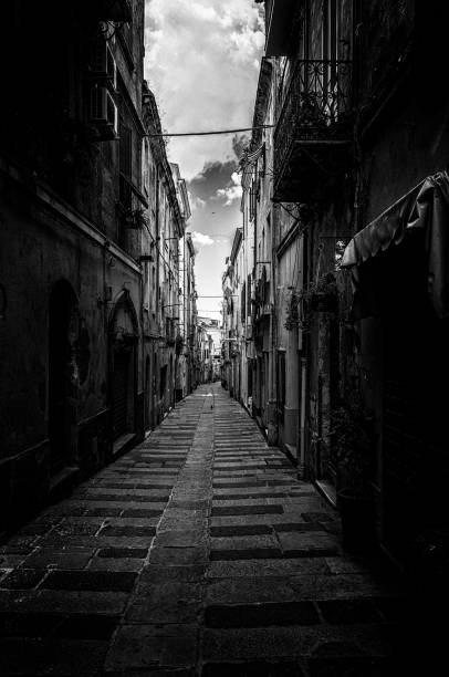 istock Dark alley in sardinian old town 952048812