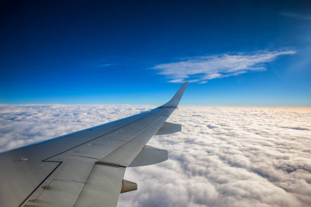 istock Flying above the clouds. Aerial view from the airplane 952048950