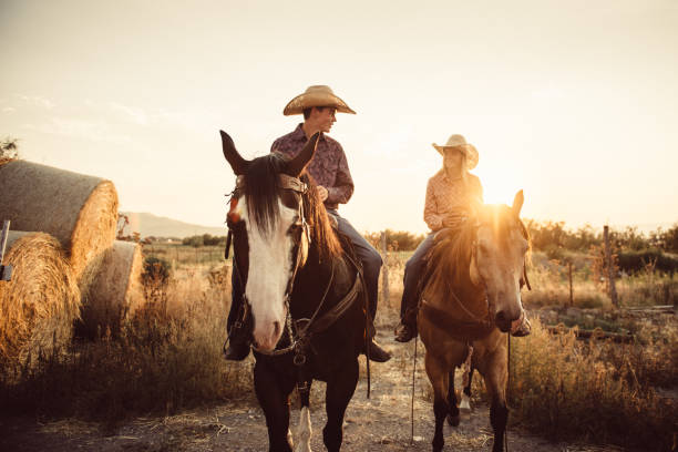 brother and sister horseback riding together - teaching child horseback riding horse imagens e fotografias de stock