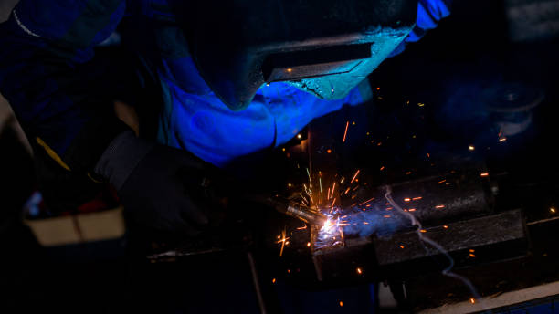istock High angle view of welder working 952051272