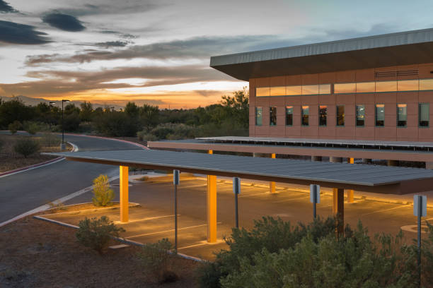 istock Sunset at empty parking lot with reflection on the mirrors 952057958